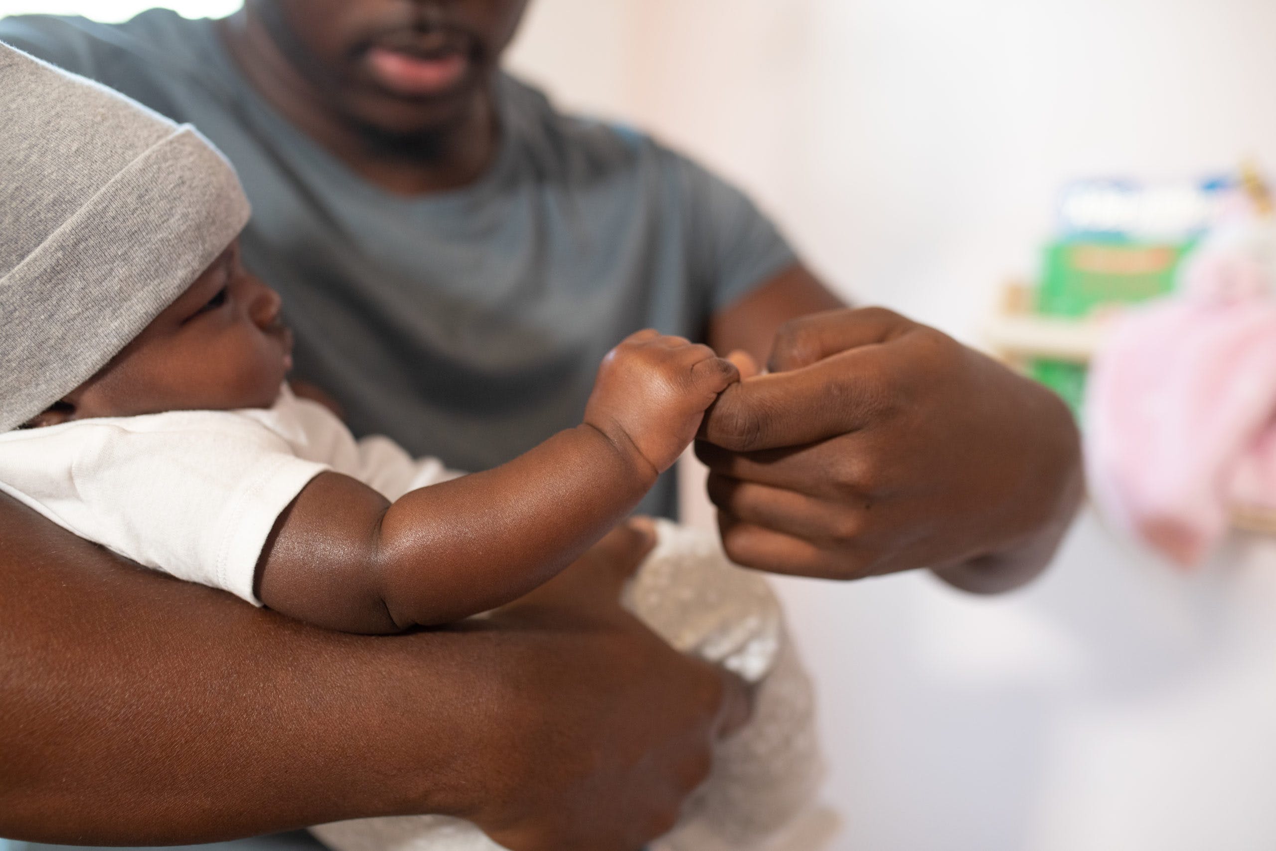 Father holding newborn