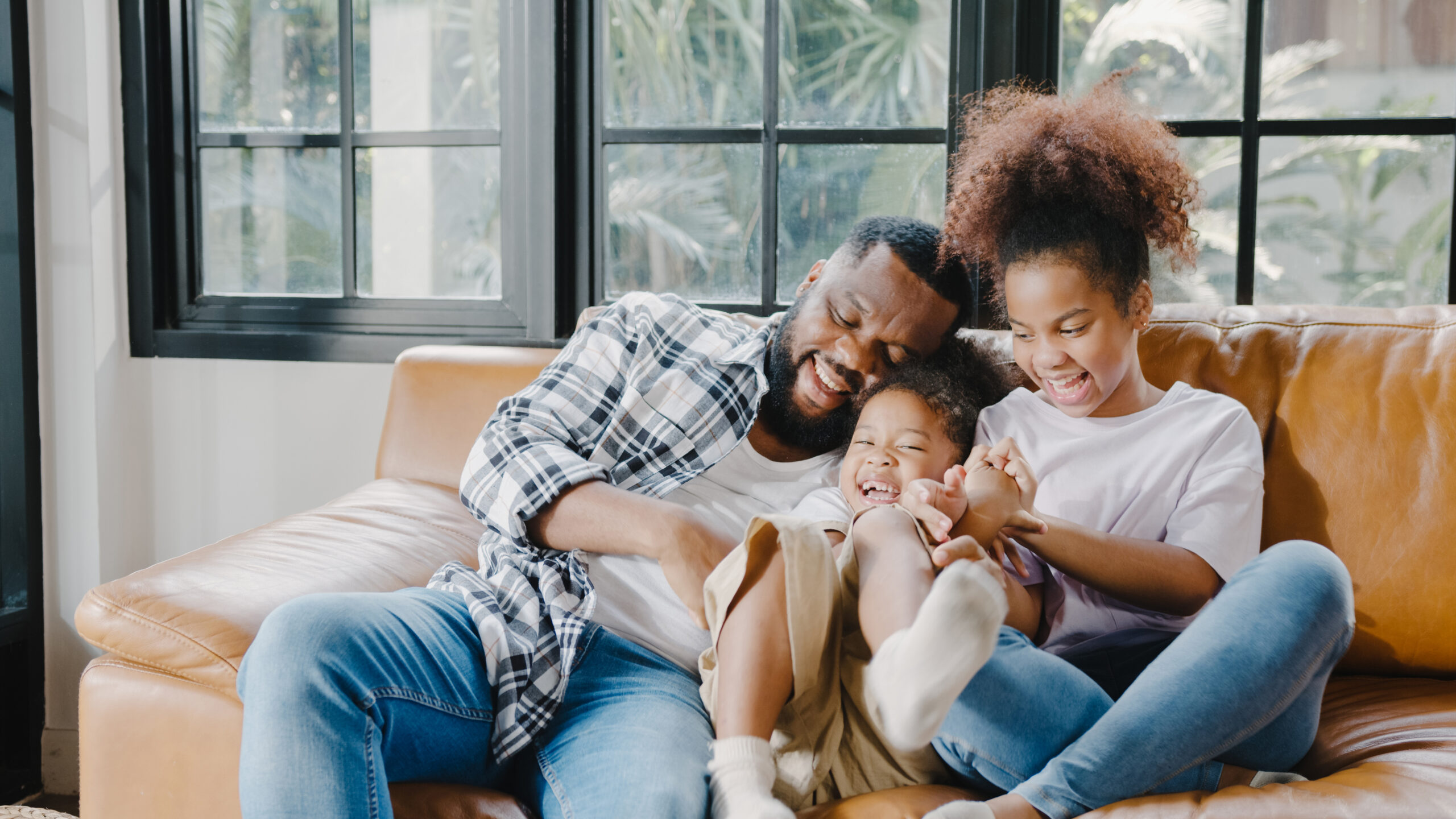 Happy cheerful African American family